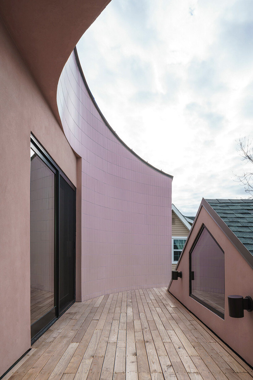 architensions builds pink tile-clad extension on top of old ranch house in the US