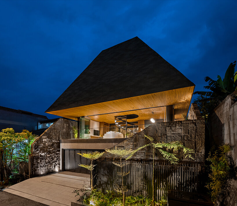 k-thengono celebrates indonesia’s vernacular architecture with rice barn inspired house