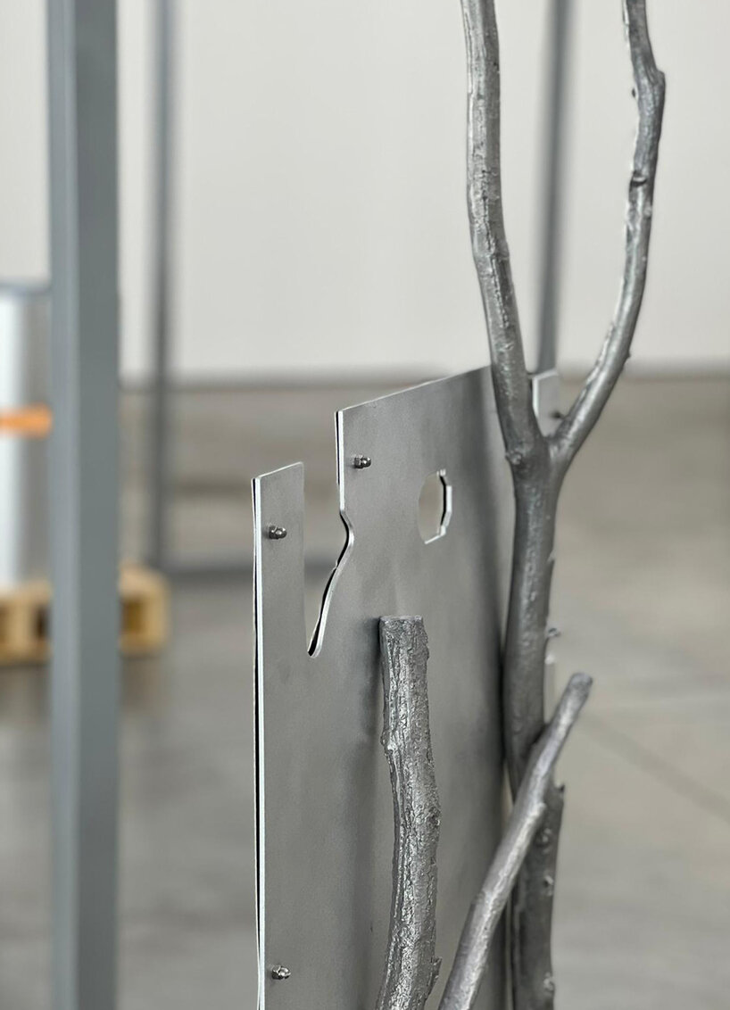 lee sisan's silver chair is made of RIMOWA's luggage pieces + cast aluminum branches