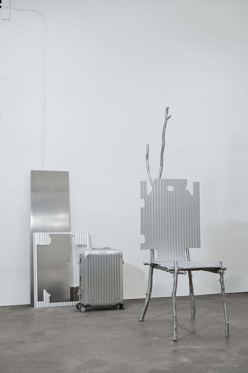  lee sisan's silver chair is made of RIMOWA's luggage pieces + cast aluminum branches