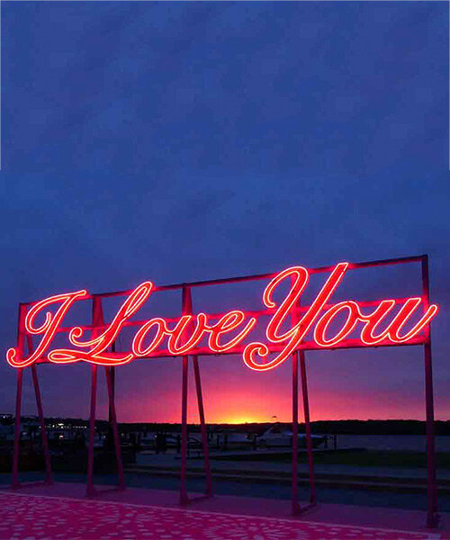 rose-hued neon monument professes its love along the alexandria waterfront in the US