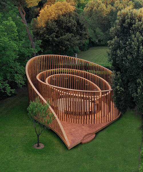 spiral wooden pavilion invites visitors to a sensory and playful experience