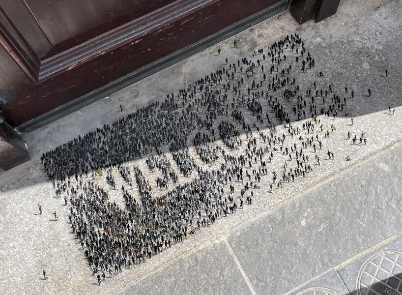 tiny figures by PEJAC drawn as WELCOME in aberdeen to support marginalized people