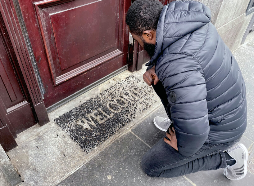 tiny figures by PEJAC drawn as WELCOME in aberdeen to support marginalized people