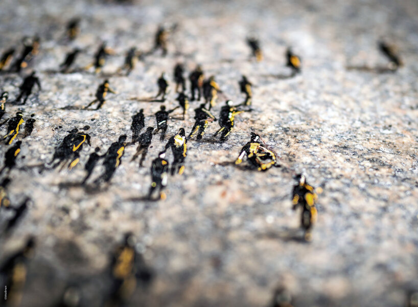 pejac's gravity-defying sneakers create surreal scenes on the streets of  london