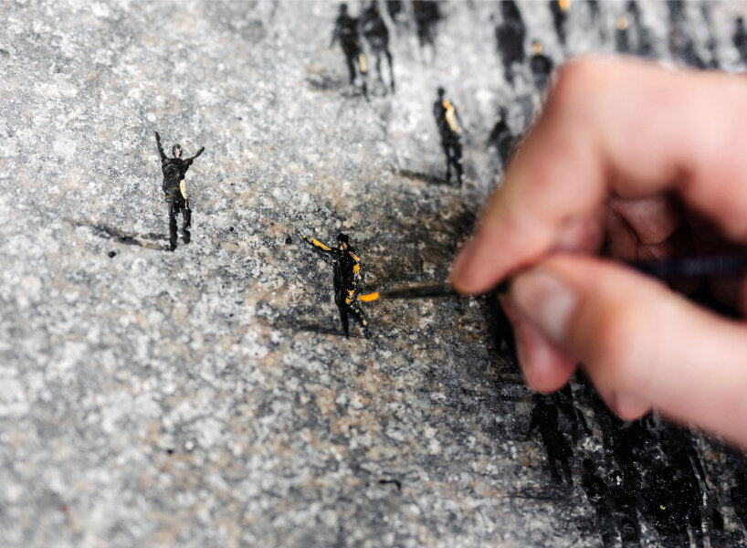 tiny figures by PEJAC drawn as WELCOME in aberdeen to support marginalized people