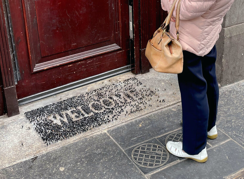 tiny figures by PEJAC drawn as WELCOME in aberdeen to support marginalized people