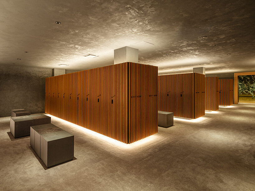 spherical saunas and indirect lighting evoke tranquility within kubo tsushima's spa in japan