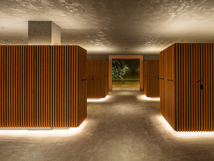 spherical saunas and indirect lighting evoke tranquility within kubo tsushima's spa in japan