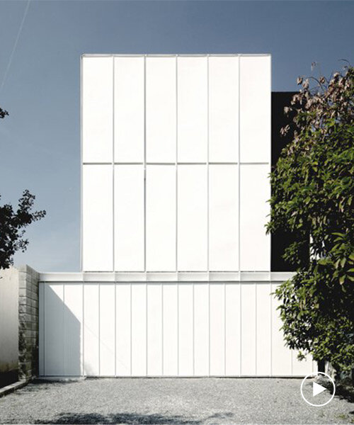 S-AR combines concrete, steel and wood for all-white art gallery with open-air patio in mexico