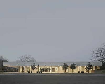 transparent pavilion welcomes visitors to UNESCO bauhaus monument in germany