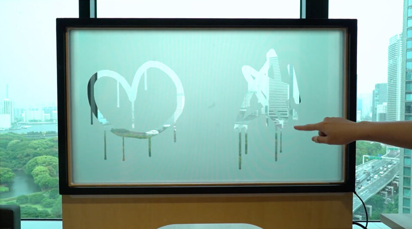 'wipe fake' is a computerized display that recreates drawing on a fogged up window