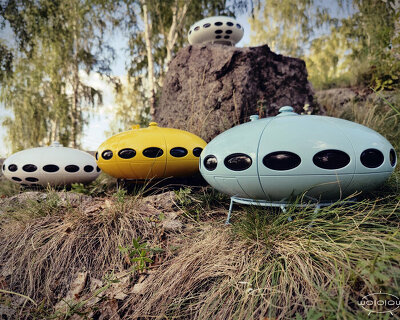 this UFO-shaped night light embodies old school sci-fi aesthetics