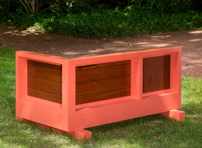 andrea zittel created five bench sculptures in soft red to gather people at esters garden house