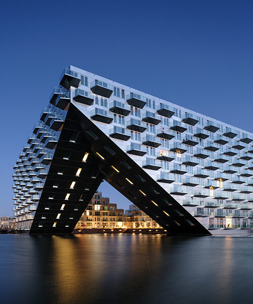 bjarke ingels + barcode architects complete floating 'sluishuis' housing in amsterdam