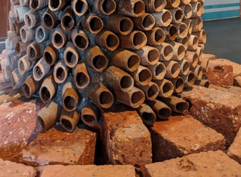 terracotta pipe installations cool down and purify humid, hot air using evaporation