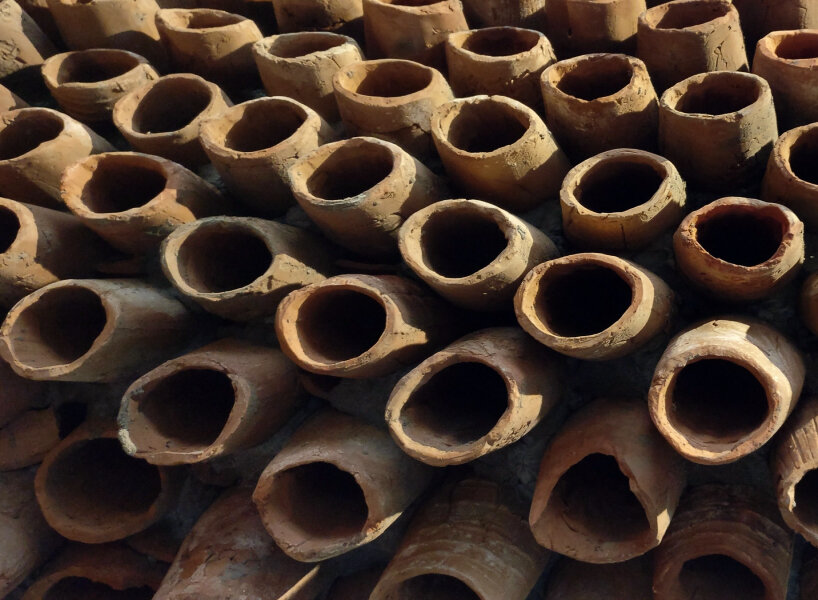 terracotta pipe installations cool down and purify humid, hot air using evaporation