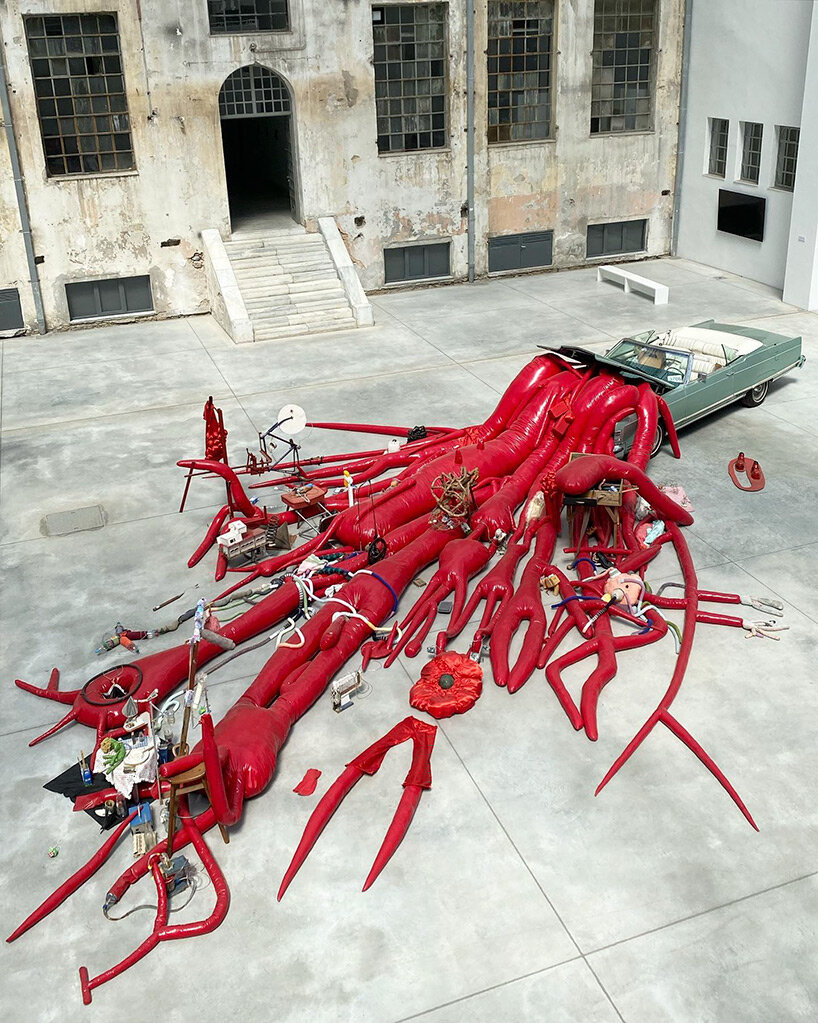 john bock's tentacle sculpture sprawls out of lincoln convertible at 'dream on' exhibition