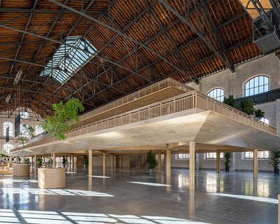 foster + partners installs demountable timber structure within disused madrid gas plant