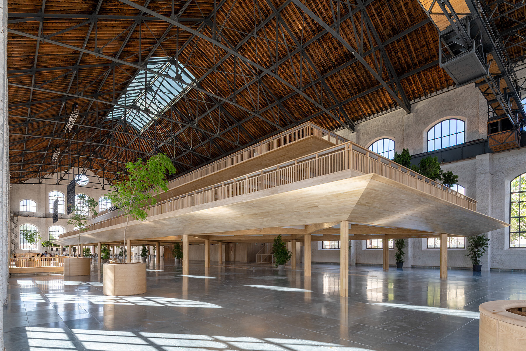 foster-partners-demountable-timber-structure-disused-madrid-gas-plant-designboom-full-width-01