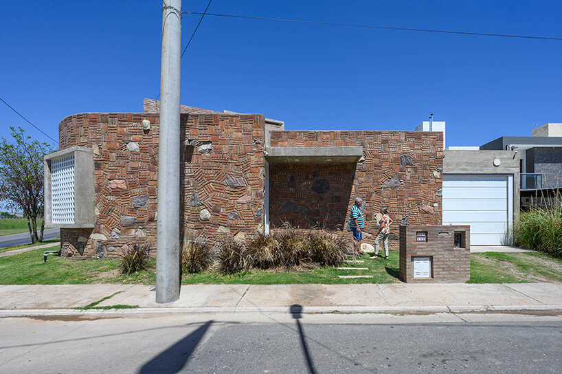 gonzalo viramonte photographs argentinian house with peculiar brick + stone cladding