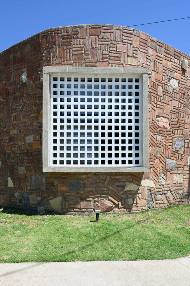 gonzalo viramonte photographs argentinian house with peculiar brick + stone cladding