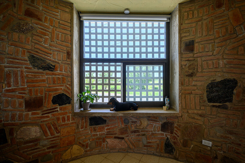gonzalo viramonte photographs argentinian house with peculiar brick + stone cladding
