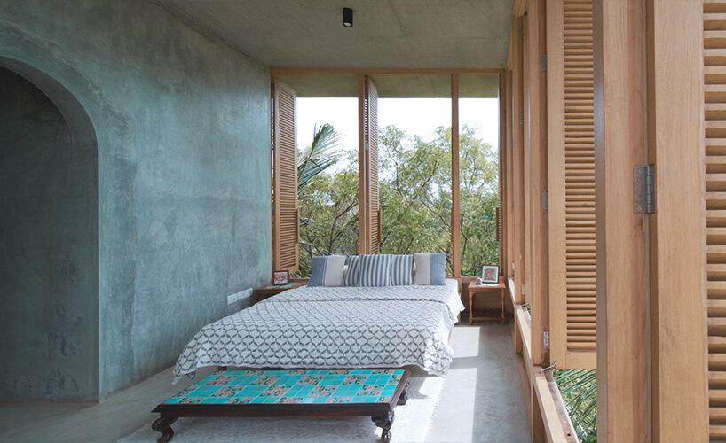 nature becomes the protagonist of taliesyn's weekend house design in rural india