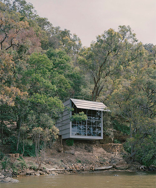 leopold banchini's off-grid cabin in australia is made of repurposed electrical posts