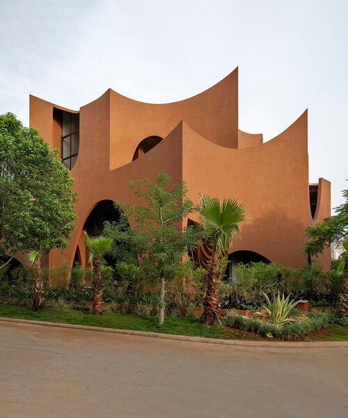 sanjay puri's 'mirai house' is a cluster of arches to shade from india's desert heat