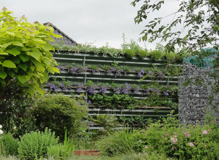 flowers and plants used as barricades to block traffic noise and pollution