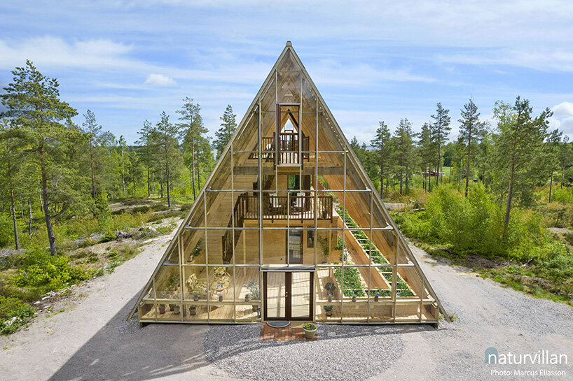 naturvillan is a self-sufficient, off-grid A-frame greenhouse home in sweden