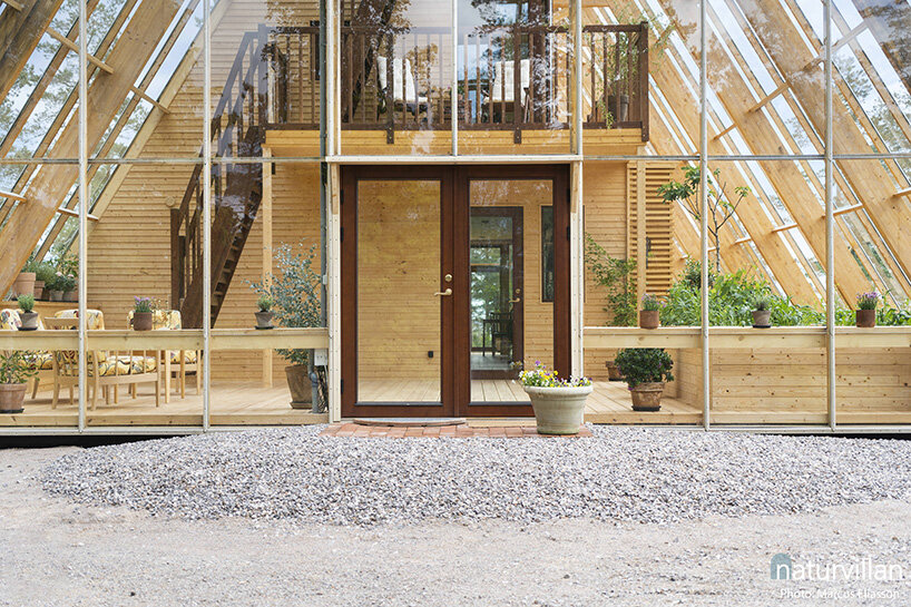 naturvillan is a self-sufficient, off-grid A-frame greenhouse in sweden