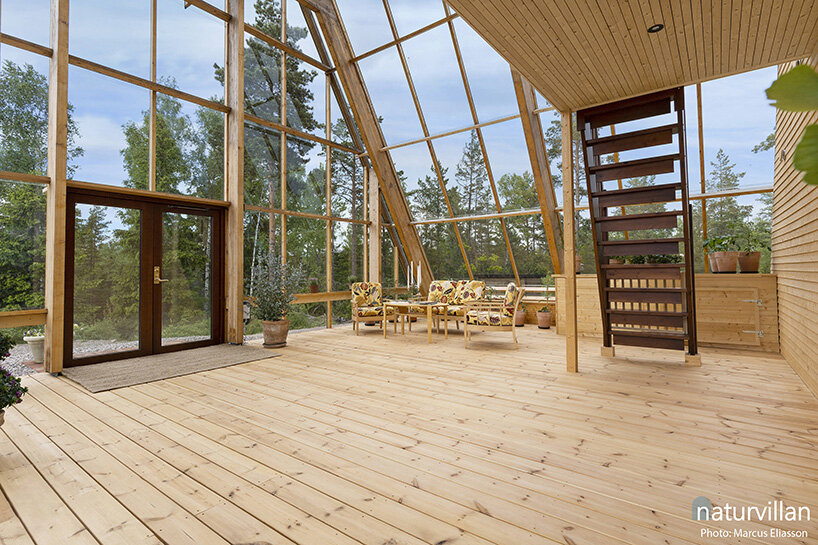 naturvillan is a self-sufficient, off-grid A-frame greenhouse in sweden