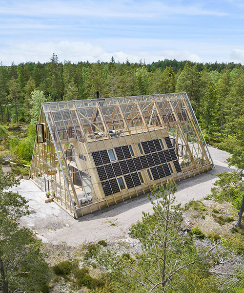 naturvillan is a self-sufficient, off-grid A-frame greenhouse home in sweden