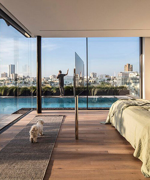 raz melamed’s SQ5 penthouse pool overlooks the bustling tel aviv cityscape