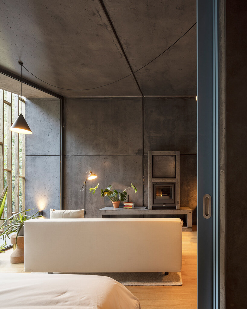 summary architecture scatters tiny hotel cabins over idyllic landscape of paradinha