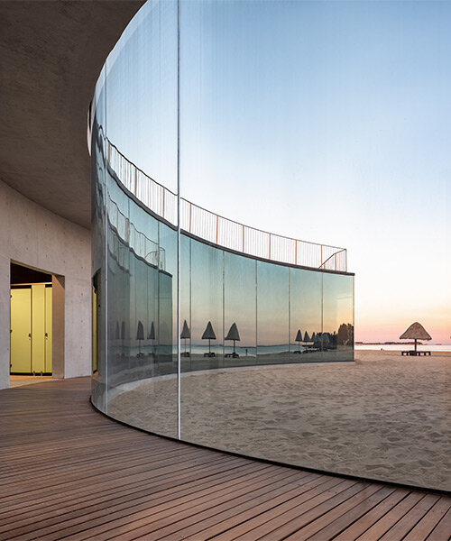 tongyi architects weaves seashell-shaped visitor center into scenic beach in china