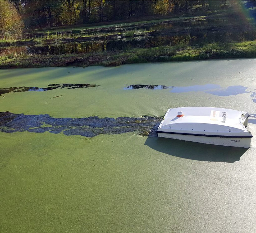 autonomous-drone wasteshark vacuums plastic waste and biomass from water