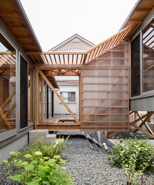 this 'house in gakuenmae' creates a peaceful garden in the urban context of nara city