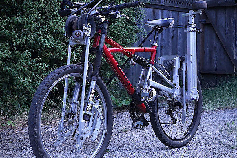 this foldable bike accessory lets you ride on abandoned railways