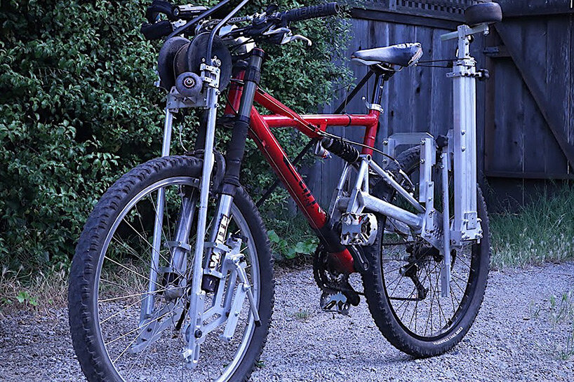 this foldable bike accesssory lets you ride on abandoned railways