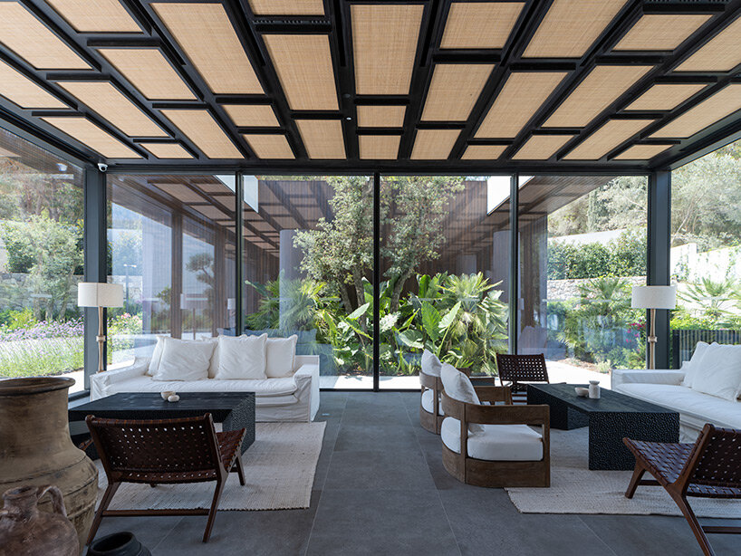 CAJA resort highlights scenic beach in turkey with arrangement of white-washed cubic villas