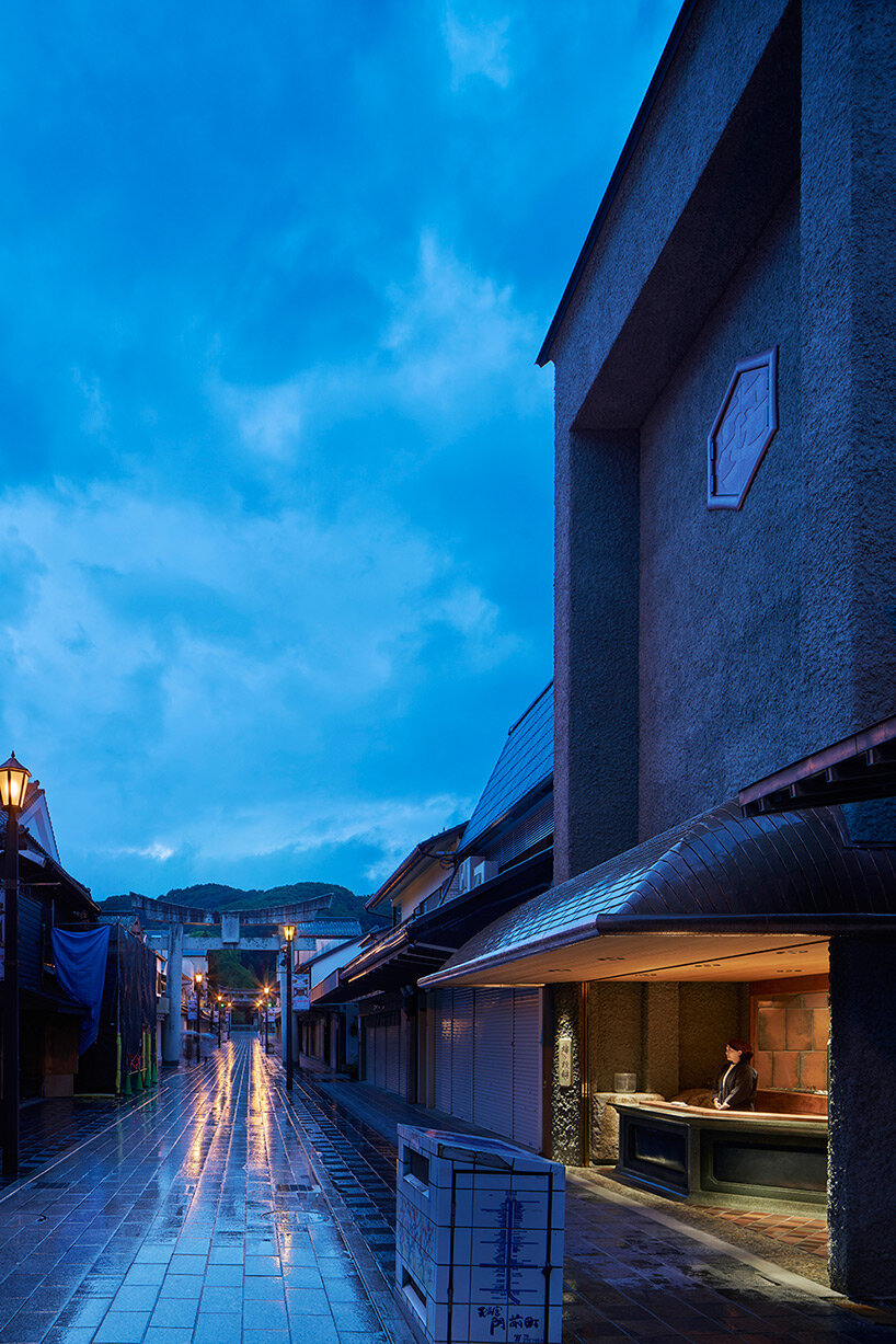 deep eaves with copper shingles protect toru shimokawa's japanese mochi shop from rain