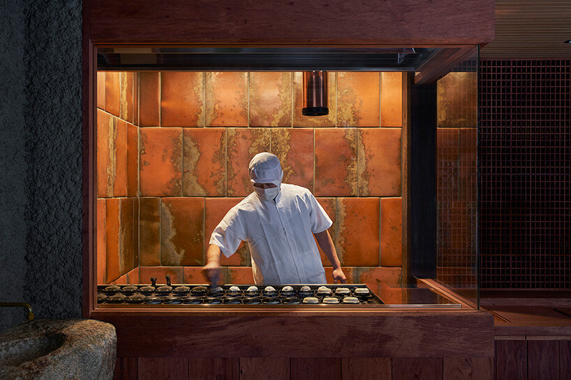 deep eaves with copper shingles protect toru shimokawa's japanese mochi shop from rain