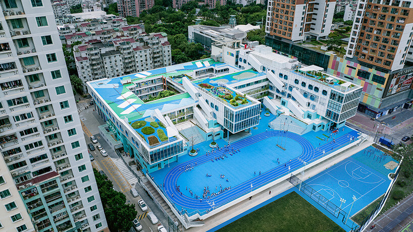 glass classrooms and learning terraces encourage interaction within PAO's school in shenzhen