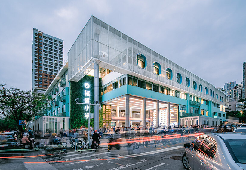 glass classrooms and learning terraces encourage interaction within PAO's school in shenzhen