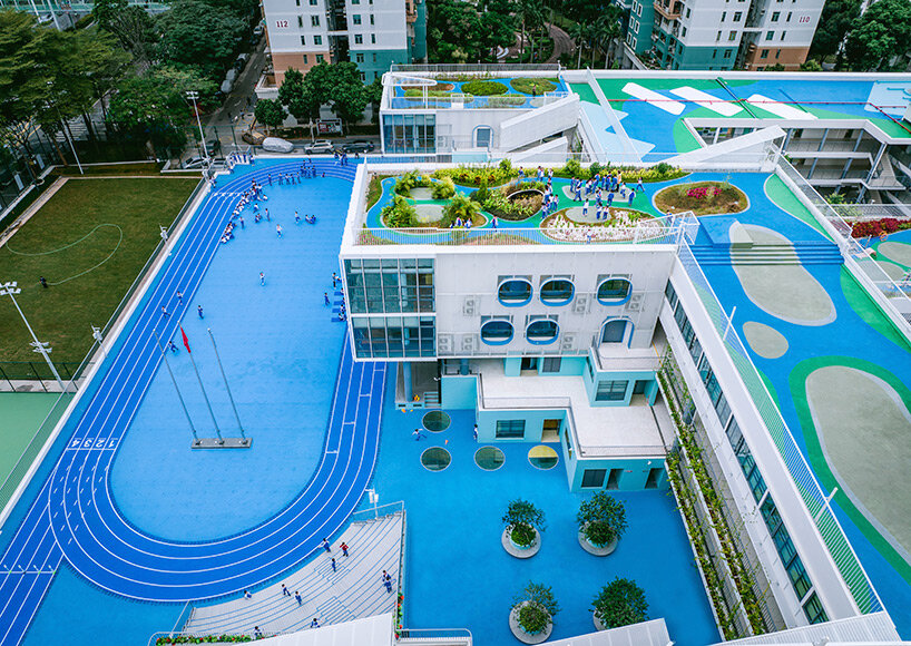 glass classrooms and learning terraces encourage interaction within PAO's school in shenzhen