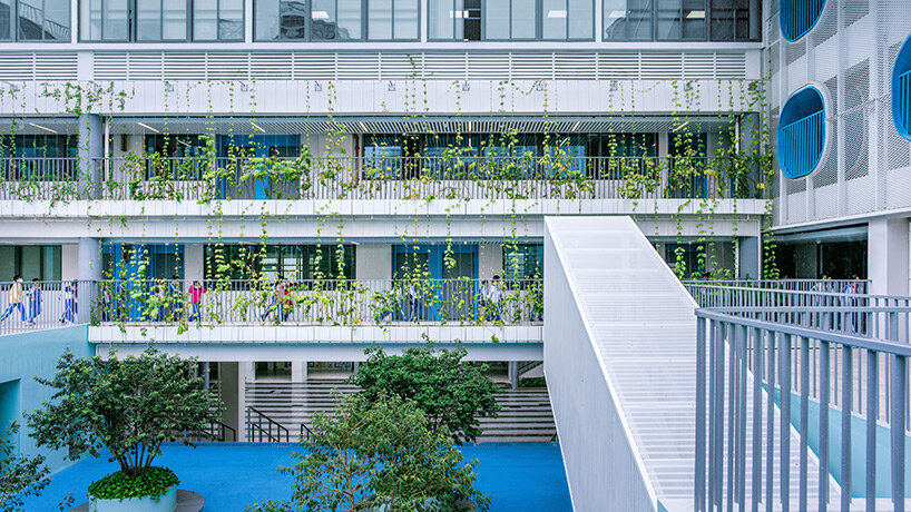 glass classrooms and learning terraces encourage interaction within PAO's school in shenzhen