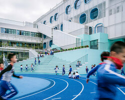 glass classrooms and learning terraces encourage interaction within PAO's school in shenzhen